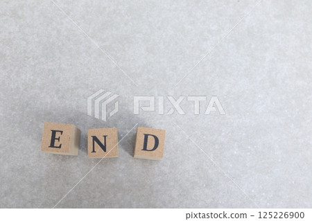 The word END on a grey background 125226900