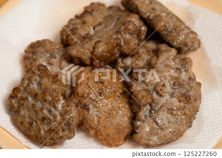 Fried sardine meatballs (stock photo) 125227260