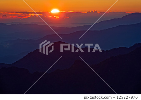 Sunrise seen from Mt. Monnai in the Iide mountain range 125227970