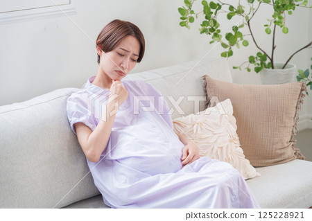 Pregnant woman thinking Pregnant woman thinking 125228921