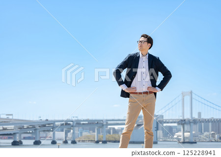 A businessman looking at a distance 125228941