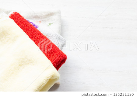 Towel handkerchief and white board background 125231150
