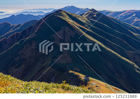 View of Baikako hut and the ridgeline to Mt. Iide Honzan from Mt. Kitamata in the Iide mountain range 125231989