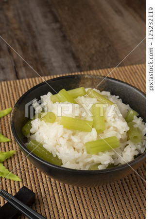 Rice cooked with butterbur in a clay pot Rice cooked with butterbur in a clay pot 125232119