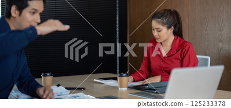 Strategic Financial Presentation. A dynamic meeting where financial strategies are discussed and visual data is shared. Strategic Financial Presentation. A dynamic meeting where financial strategies are discussed and visual data is shared. 125233378