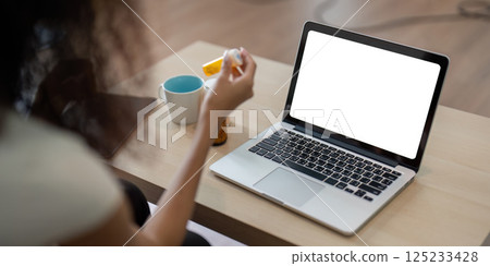 Telemedicine and Digital Healthcare. Patient consulting with a healthcare provider virtually about medication management. Telemedicine and Digital Healthcare. Patient consulting with a healthcare provider virtually about medication management. 125233428