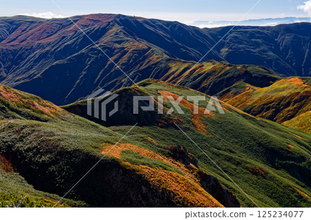 Autumn-colored Mt. Gonishi seen from the Iide mountain range's main ridgeline trail Autumn-colored Mt. Gonishi seen from the Iide mountain range's main ridgeline trail 125234077