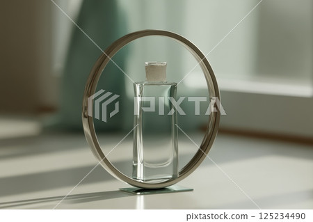 Transparent skincare serum bottle levitating inside a circular frame with soft light Transparent skincare serum bottle levitating inside a circular frame with soft light 125234490