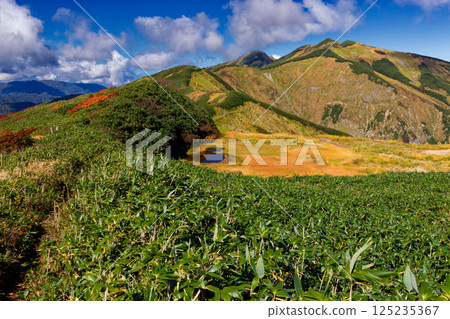 Autumnal Iide mountain range, Tengu-no-niwa and the ridgeline leading to Mt. Eboshi and Mt. Kitamata Autumnal Iide mountain range, Tengu-no-niwa and the ridgeline leading to Mt. Eboshi and Mt. Kitamata 125235367