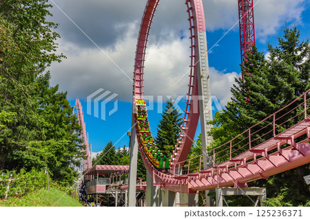 On a clear summer day, the suspended roller coaster Hurricane at Rusutsu Resort in Hokkaido 125236371