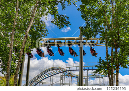 On a clear summer day, the suspended roller coaster Hurricane at Rusutsu Resort in Hokkaido 125236393