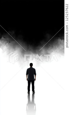 person stands facing swirling cloud of ink and shadow person stands facing swirling cloud of ink and shadow 125237622