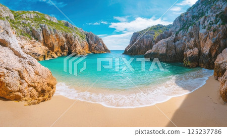 A beautiful beach with a blue ocean and a rocky shore A beautiful beach with a blue ocean and a rocky shore 125237786