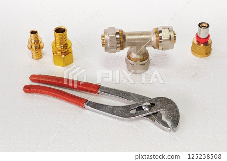 plumbing fittings and adjustable wrenches 125238508