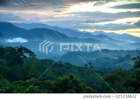 Misty Mountain Ranges at Sunrise 125238612