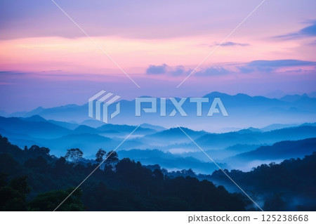Misty Mountain Range at Sunrise 125238668