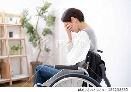 Women suffering wheelchair 125238865
