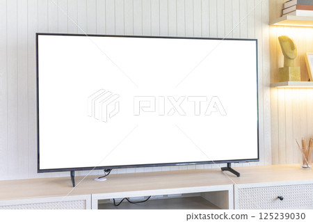 Comfortable room with modern LED TV and wooden CABINET. 125239030
