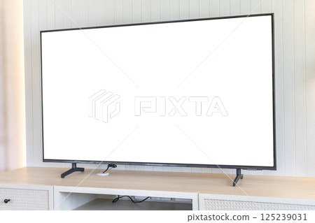 Comfortable room with modern LED TV and wooden CABINET. Comfortable room with modern LED TV and wooden CABINET. 125239031