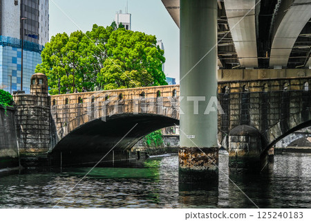 View from the Kanda River Cruise Ship: Boat Transport, Nihonbashi River and Shuto Expressway Pier View from the Kanda River Cruise Ship: Boat Transport, Nihonbashi River and Shuto Expressway Pier 125240183
