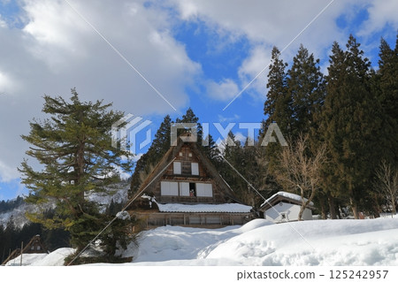 A Gassho-style house with open paper screens in Ainokura Gassho-style village A Gassho-style house with open paper screens in Ainokura Gassho-style village 125242957