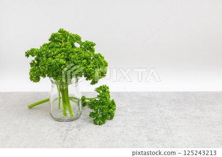 Parsley stock photo: Parsley on a white background Parsley stock photo: Parsley on a white background 125243213