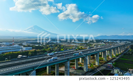 Aerial view of Mt. Fuji and the highway running through the plains 125243495