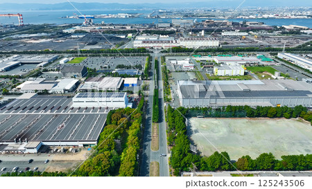 Aerial view of an industrial area lined with factories Aerial view of an industrial area lined with factories 125243506