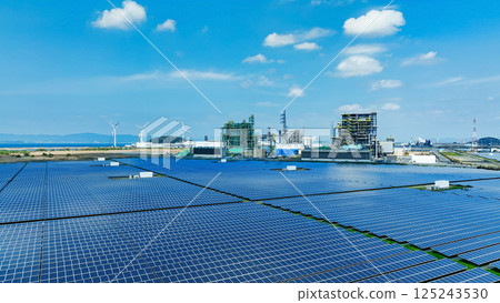 Aerial view of biomass power plant and wind and solar power plant 125243530
