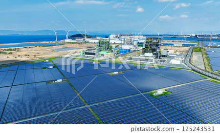 Aerial view of biomass power plant and wind and solar power plant 125243531