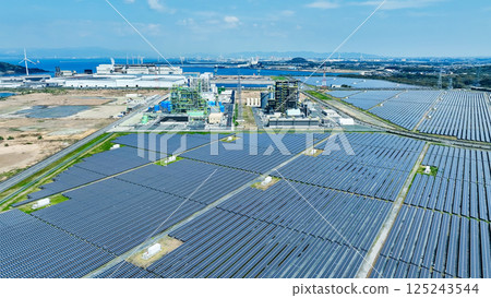 Aerial view of industrial area and mega solar power plant 125243544