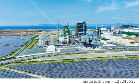Aerial view of biomass power plant and wind and solar power plant 125243555