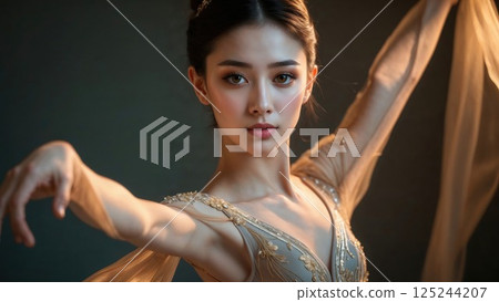 A stunning young ballerina in a delicate pose, wearing a soft beige tutu, radiating elegance and grace, captured in a moment of beauty and poise under soft lighting 125244207