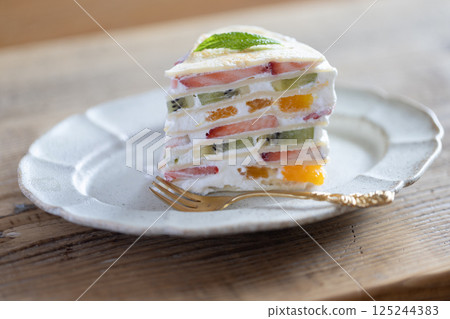 Mille crepes filled with fruit 125244383