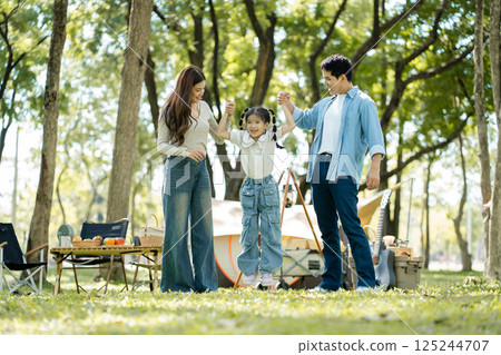 Happy asian family picnic in park, weekend lifestyle outdoors. Happy asian family picnic in park, weekend lifestyle outdoors. 125244707