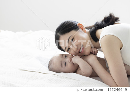 4 month old baby and mom 4 month old baby and mom 125246649