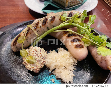 Assortment of 3 kinds of grilled sausages Assortment of 3 kinds of grilled sausages 125246714