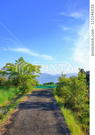 Take a stroll while looking out at the sea 125246838