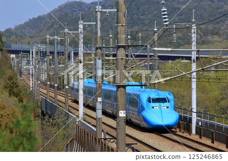 Shinkansen trains wrapped in designs featuring popular anime 125246865