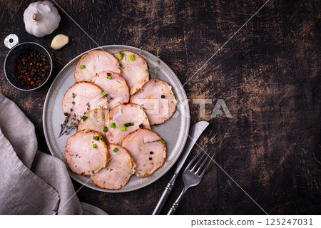 Sliced chicken sausage with herbs Sliced chicken sausage with herbs 125247031