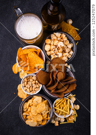 Beer and different snacks for Superbowl or football party 125247079