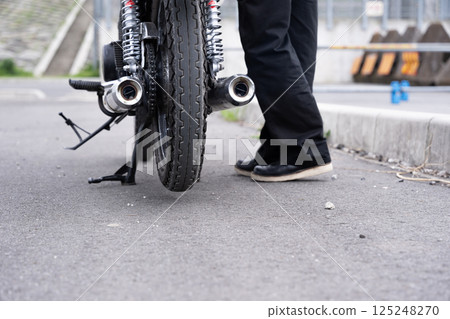Motorcycle, vintage car, exhaust gas regulations 125248270