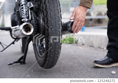 Motorcycle, vintage car, exhaust gas regulations 125248272