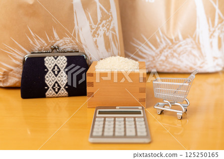 Rice price Rice price Image of household finances, rice in a wooden box and a bag of rice, shopping cart, calculator, wallet, 10,000 yen note Rice price Rice price Image of household finances, rice in a wooden box and a bag of rice, shopping cart, calculator, wallet, 10,000 yen note 125250165