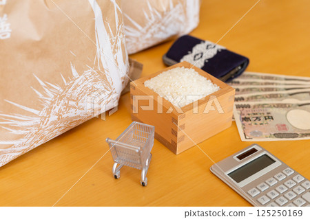 Rice price Rice price Image of household finances, rice in a wooden box and a bag of rice, shopping cart, calculator, wallet, 10,000 yen note Rice price Rice price Image of household finances, rice in a wooden box and a bag of rice, shopping cart, calculator, wallet, 10,000 yen note 125250169
