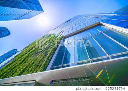Tokyo cityscape in Japan: Summer-like heat...View of Shibuya Scramble Square and Shibuya Stream reflected in the window glass Tokyo cityscape in Japan: Summer-like heat...View of Shibuya Scramble Square and Shibuya Stream reflected in the window glass 125251734