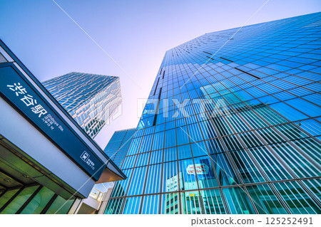 Tokyo cityscape in Japan, overlooking Shibuya Station, Shibuya Scramble Square, and Shibuya Hikarie reflected in the windows Tokyo cityscape in Japan, overlooking Shibuya Station, Shibuya Scramble Square, and Shibuya Hikarie reflected in the windows 125252491