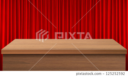 An empty wooden table with a red curtain as a background. An empty wooden table with a red curtain as a background. 125252592