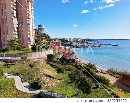 Aerial stunning coastal view of Dehesa de Campoamor on Costa Blanca 125255852