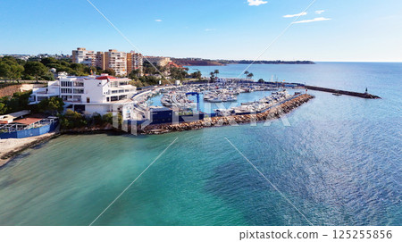 Aerial stunning coastal view of Dehesa de Campoamor on Costa Blanca 125255856